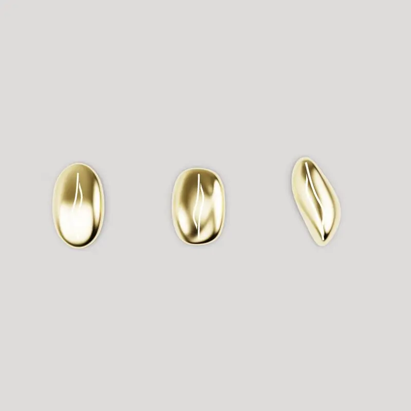 Three gold pebble shapes side by side, each a different silhouette, on a grey ground.