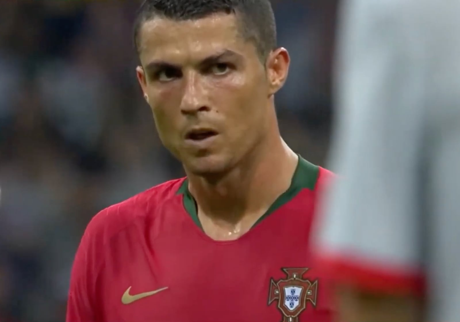 Footballer Cristiano Ronaldo taking deep breaths before shooting a free kick, helping to calm nerves and focus in a high-pressure moment.