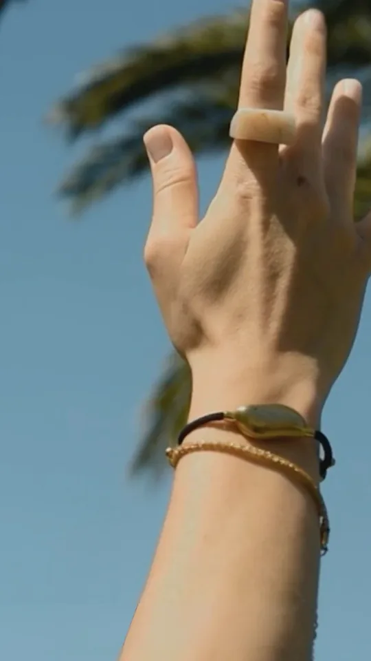 Close-up of a wrist wearing the Sou band